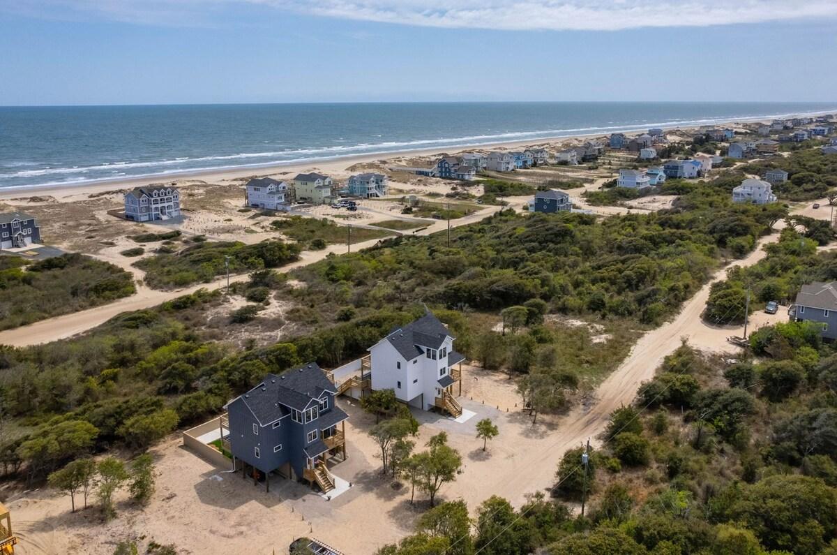Aerial looking across the dune line toward the Atlantic
